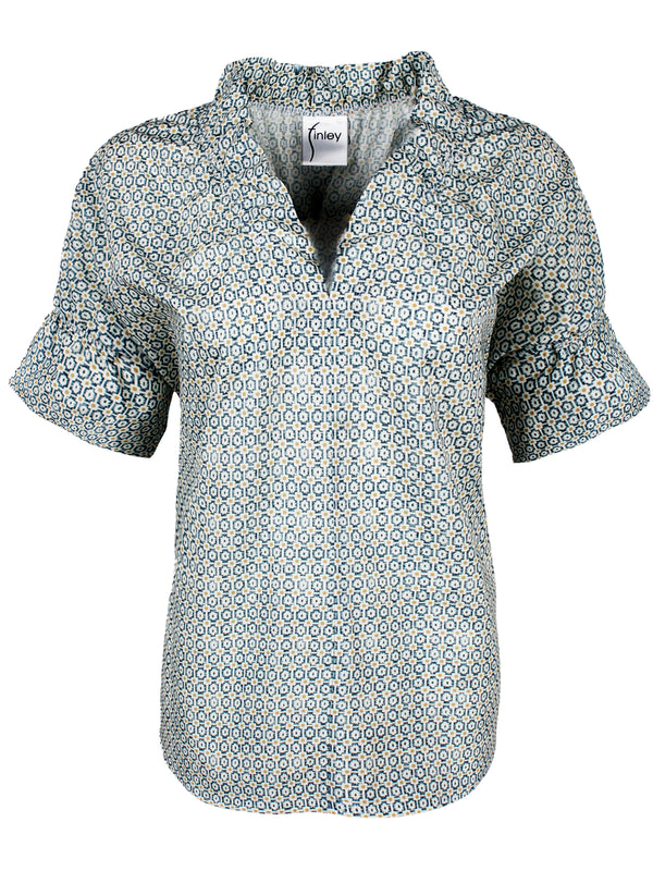 A front view of Finley Crosby, a short sleeve womens blouse with ruffle collar and sleeve details and a geometric blue pattern.