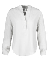 A front view of the Finley Elsa blouse, a double gauze v-neck cotton white popover blouse with a relaxed fit.