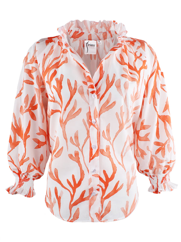 A front view of the Finley Fiona, a ruched button-down womens blouse with a ruffle collar, 3/4 blouson sleeves, and an orange coral reef watercolor print.