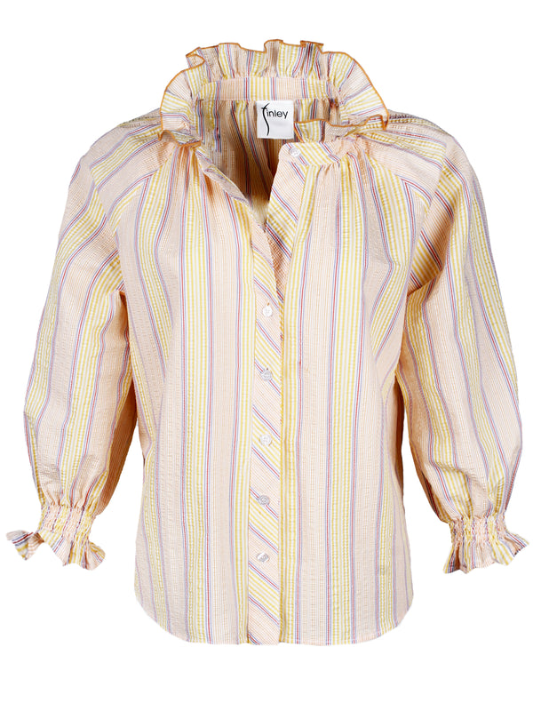 A front view of the Finley Fiona, a gray & yellow seersucker striped blouse with 3/4 blouson sleeves, a ruffle collar, and a relaxed contour.