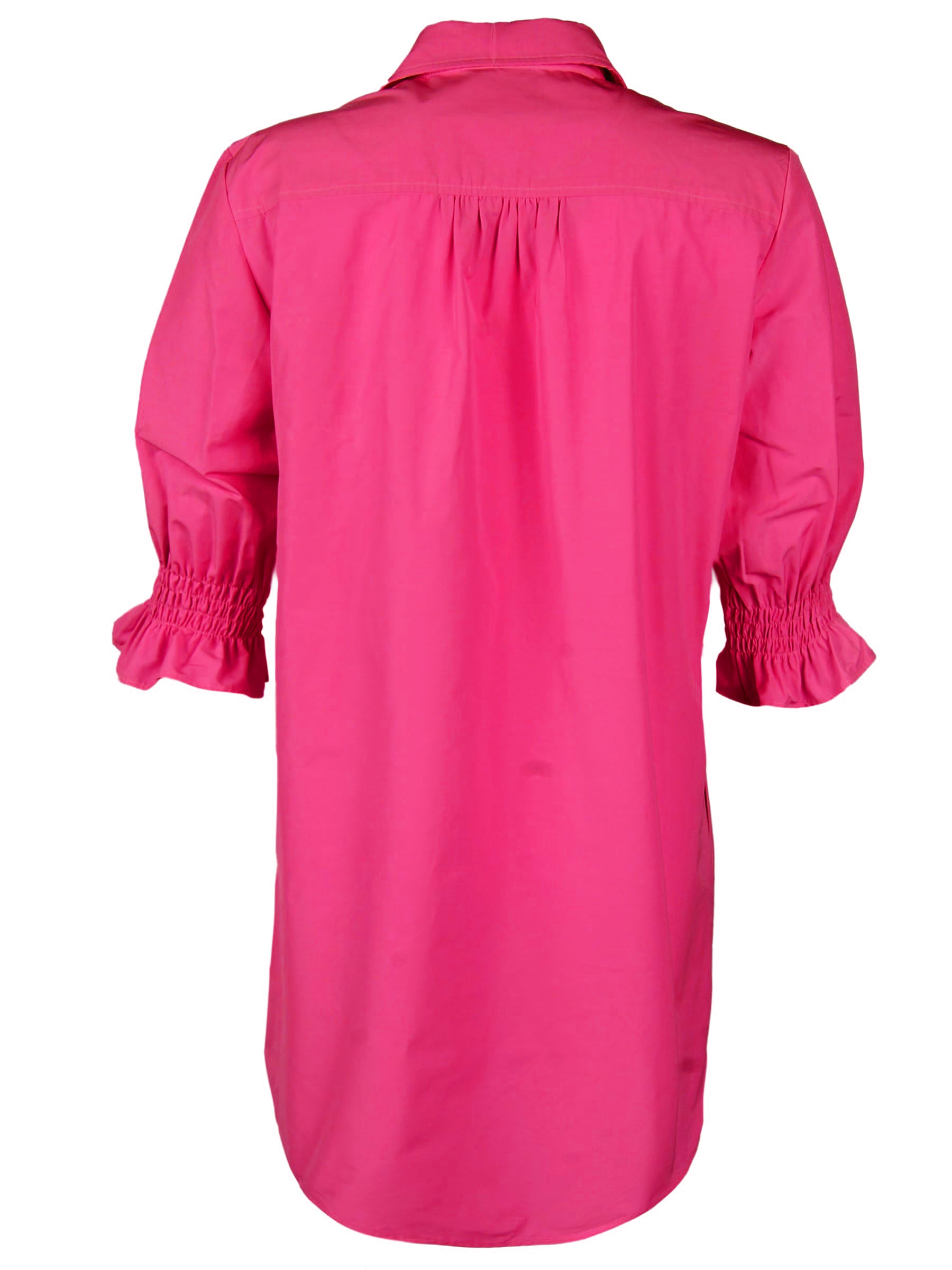 a back view of the Miller shirt dress in fuschia, with puff sleeves and a relaxed silhouette
