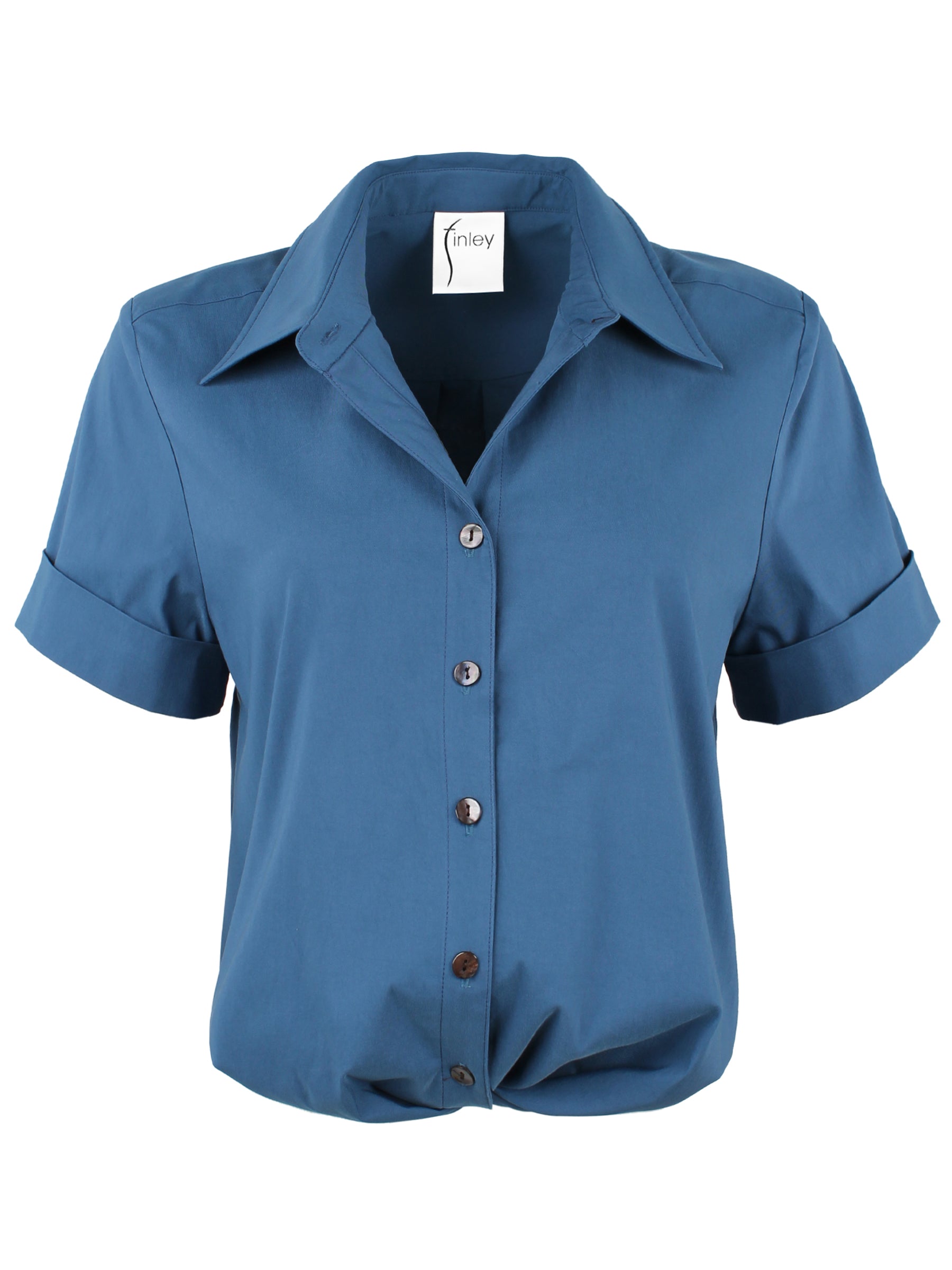 A front view of the Alli blouse in indigo, cropped with a twist-front hem and cuffed sleeves.
