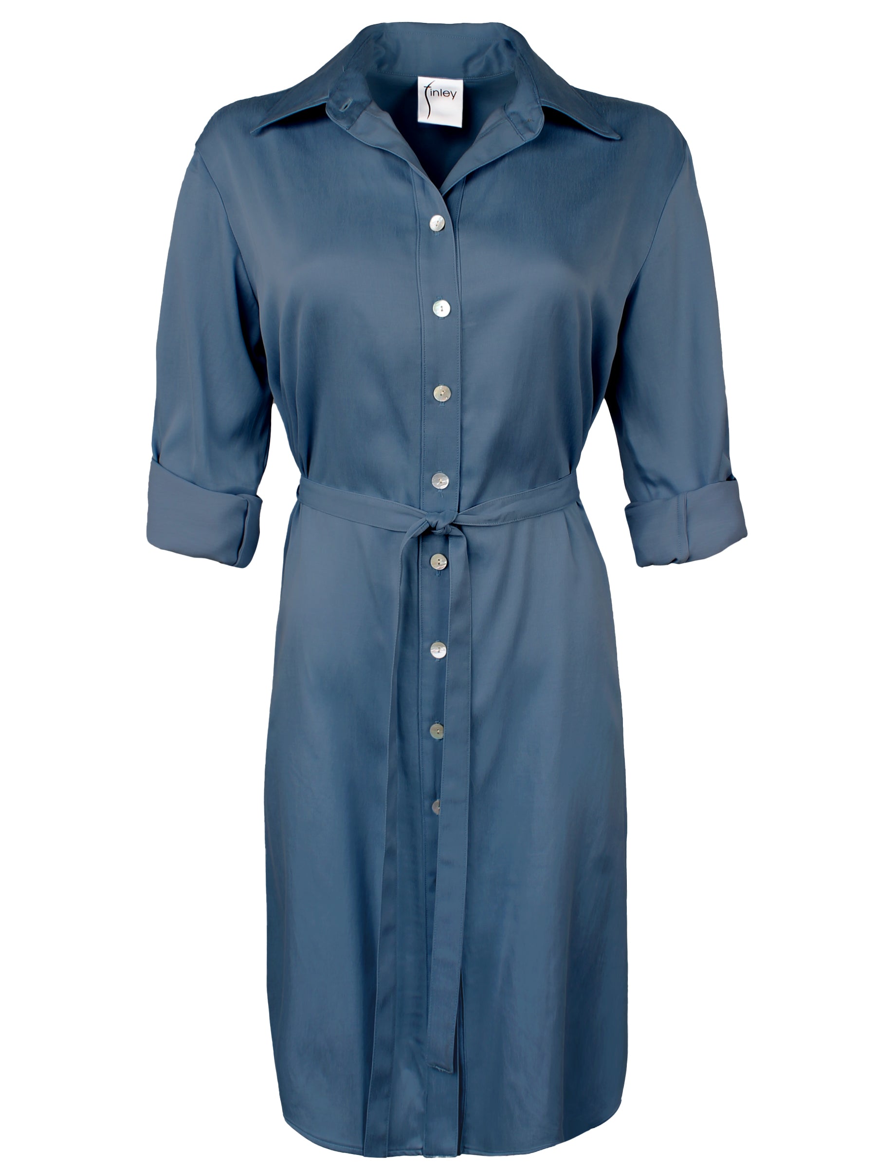 A front view of the Carter shirt dress, featuring a tie-front, dark teal color, a-line silhouette, relaxed contour, and crafted from cupro cotton.
