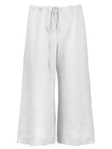 A front view of the Finley wide leg washed linen drawstring pants, with side pockets and a relaxed contour