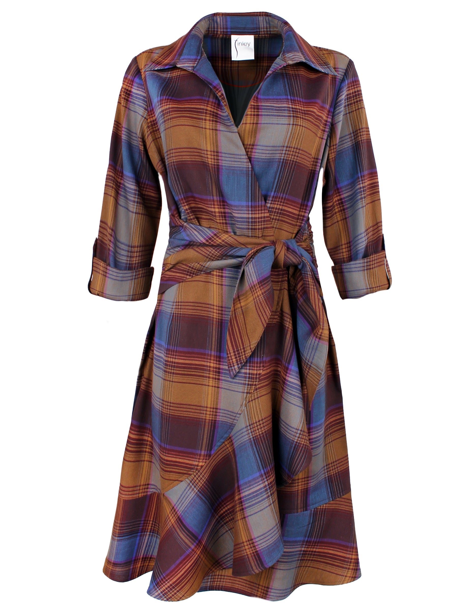 A front view of the Farrah shirt dress, featuring a tie-front, midi wrap design, a-line silhouette, cotton viscose fabric, purple plaid, and flounce ruffle hem.
