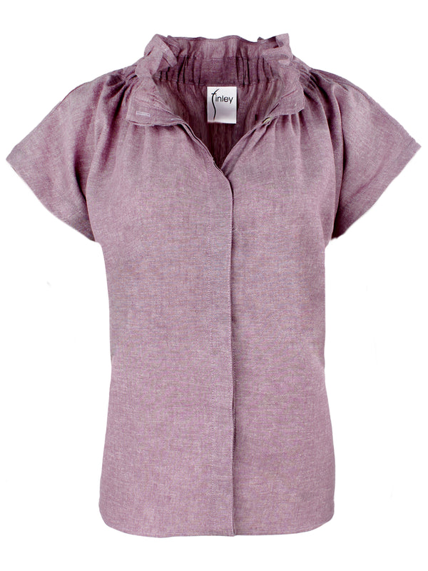 A front view of the Finley Jenny top, a purple hemp ruched popover blouse with a ruffle v-neck and a relaxed contour.