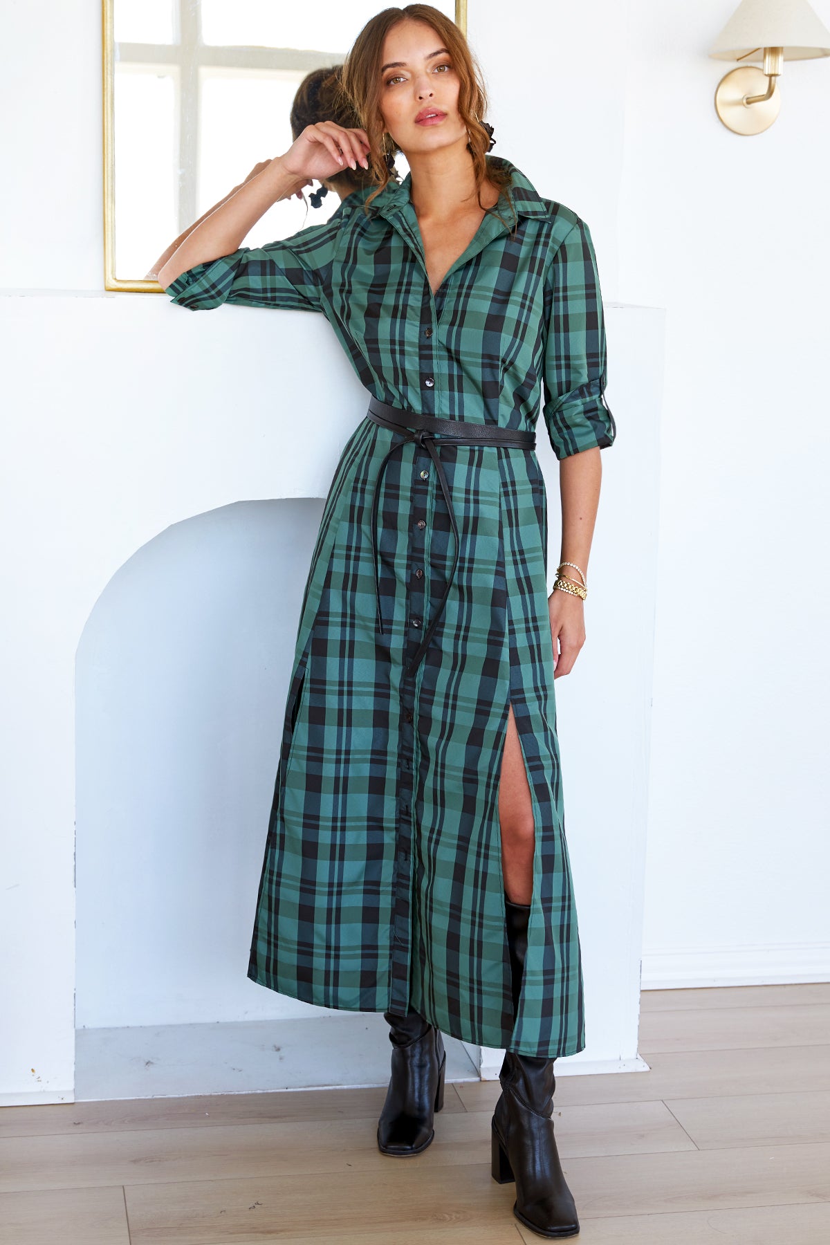 Another view of the Laine tie-front maxi dress in emerald green plaid polyester with an A-line silhouette.
