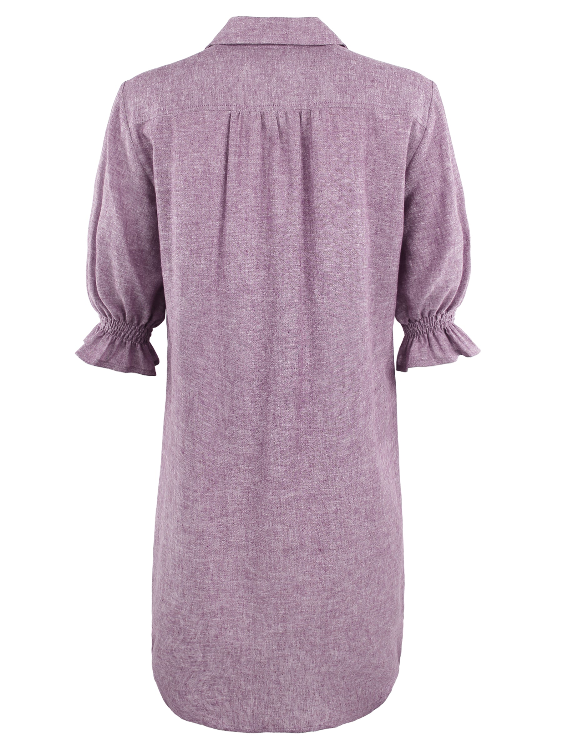 A front view of the Miller shirt dress, made from a hemp cotton blend in lavender purple with elbow-length puff sleeves, chambray fabric, and pockets.
