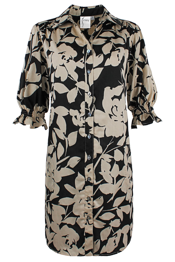 A front view of the Finley Miller dress, a button down shirt dress with short puff sleeves in a black & tan floral print.